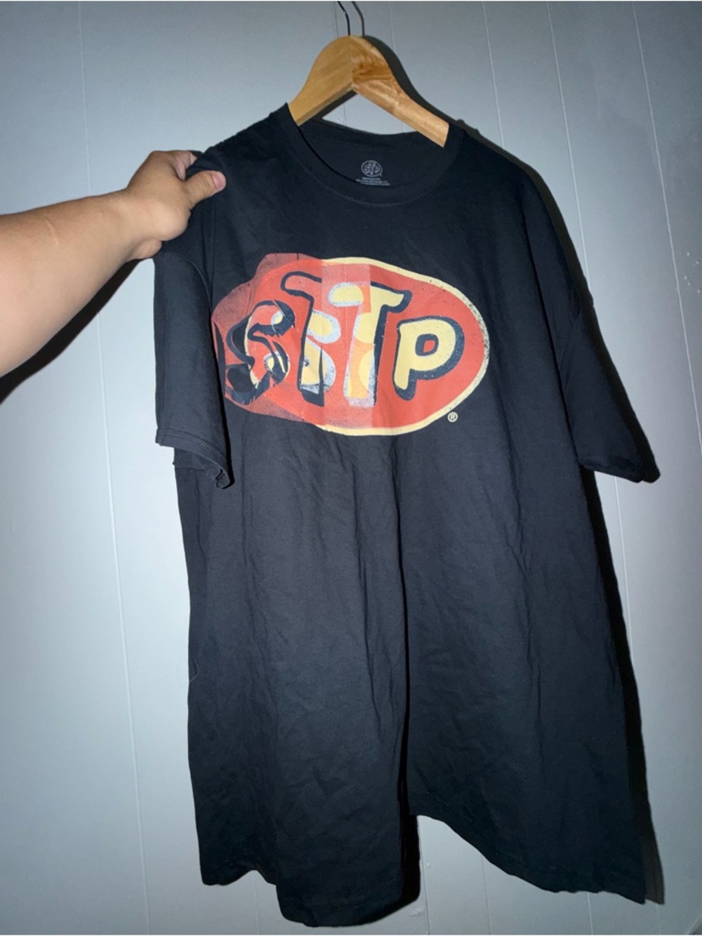 Black Graphic Tee with Red & Yellow Logo